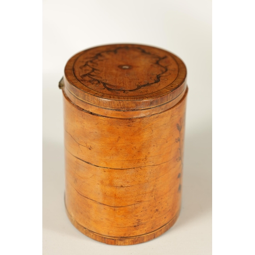 560 - A GEORGE III INLAID SATINWOOD OVAL SHAPED TEA CADDY with crossbanded edges and branchwork inlays. (1... 