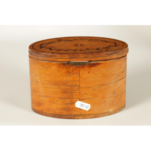 560 - A GEORGE III INLAID SATINWOOD OVAL SHAPED TEA CADDY with crossbanded edges and branchwork inlays. (1... 