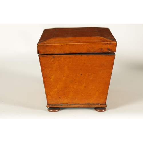 563 - A LATE GEORGIAN BURR MAPLE SARCOPHAGUS TEA CADDY the chamfered lid enclosing a divided lidded interi... 