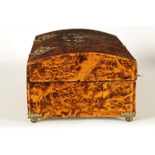 566 - A LATE 17TH CENTURY DOME TOPPED MULBERRY WOOD CASKET with iron work handle, pierced brass hinges and... 