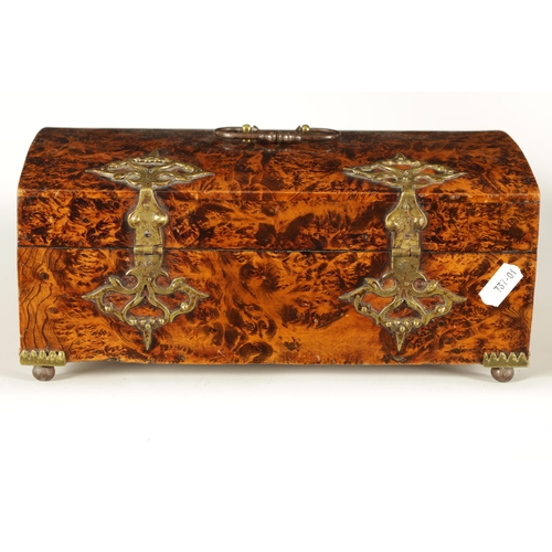 566 - A LATE 17TH CENTURY DOME TOPPED MULBERRY WOOD CASKET with iron work handle, pierced brass hinges and... 