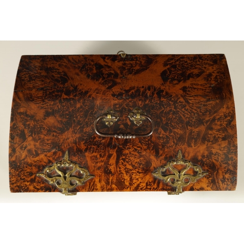 566 - A LATE 17TH CENTURY DOME TOPPED MULBERRY WOOD CASKET with iron work handle, pierced brass hinges and... 