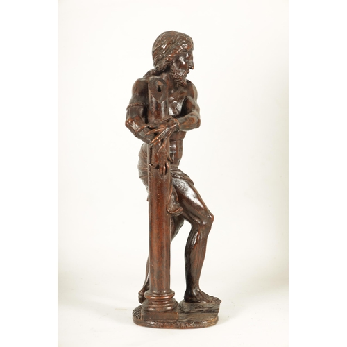 578 - A GOOD 17TH CENTURY CONTINENTAL CARVED WALNUT FIGURE OF CHRIST having superb colour and patina depic... 