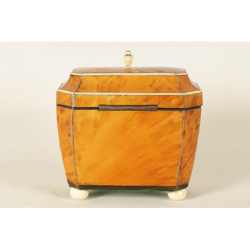 582 - A REGENCY TORTOISESHELL AND IVORY BANDED SARCOPHAGUS TEA CADDY with hinged moulded lid enclosing a d... 