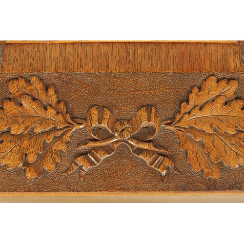 587 - A LATE 19TH CENTURY BLACK FOREST CARVED OAK FRAME with carved leaf work borders inscribed and dated ... 