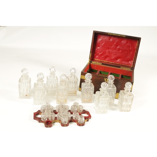 591 - A GEORGE III BRASS BOUND MAHOGANY CAMPAIGN DECANTER SET the box with brass straps and flush fitting ... 