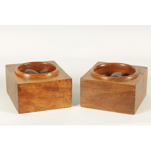 596 - A MATCHED PAIR OF 19TH CENTURY ELM CASH DISPENSERS with turned deep centres TOGETHER WITH FOUR MARIN... 