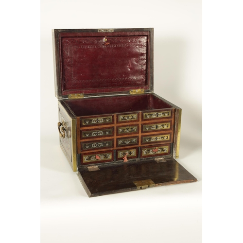 600 - AN EARLY 18TH CENTURY GERMAN PEWTER, BRASS AND TORTOISESHELL BOULLE WORK TABLE CABINET IN THE MANNER... 