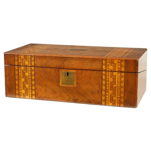 604 - A 19TH CENTURY INLAID WALNUT WRITING BOX with hinged lid opening to reveal a fitted interior with wr... 