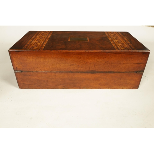 604 - A 19TH CENTURY INLAID WALNUT WRITING BOX with hinged lid opening to reveal a fitted interior with wr... 