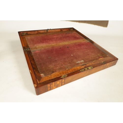 604 - A 19TH CENTURY INLAID WALNUT WRITING BOX with hinged lid opening to reveal a fitted interior with wr... 