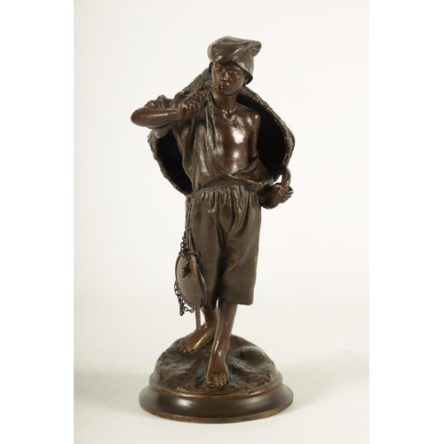 617 - A LATE 19TH CENTURY ITALIAN BRONZE SCULPTURE modelled as a Neapolitan fisherman on naturalistic circ... 