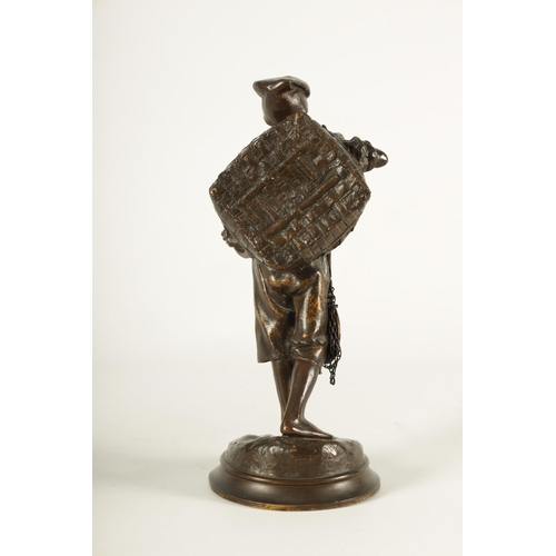 617 - A LATE 19TH CENTURY ITALIAN BRONZE SCULPTURE modelled as a Neapolitan fisherman on naturalistic circ... 