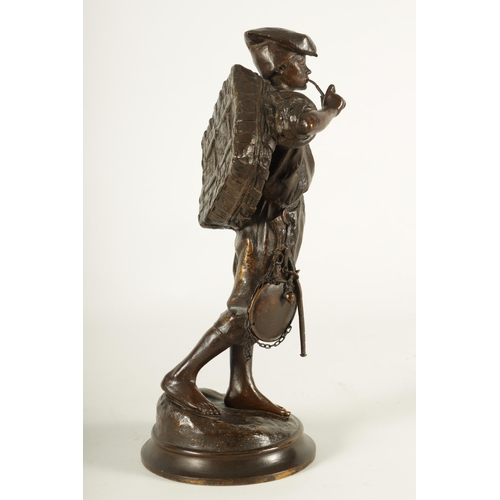 617 - A LATE 19TH CENTURY ITALIAN BRONZE SCULPTURE modelled as a Neapolitan fisherman on naturalistic circ... 