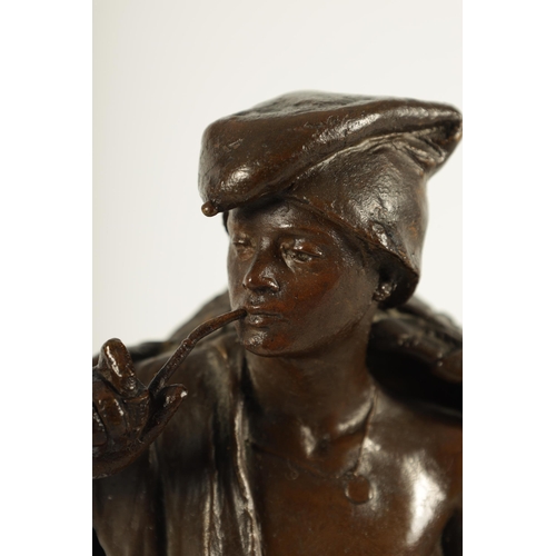 617 - A LATE 19TH CENTURY ITALIAN BRONZE SCULPTURE modelled as a Neapolitan fisherman on naturalistic circ... 