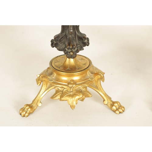 621 - A PAIR OF LATE 19TH CENTURY FRENCH BARBEDIENNE STYLE BRONZE AND ORMOLU CANDLESTICKS with naturalisti... 