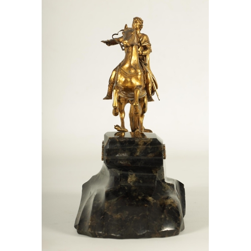 623 - A 19TH CENTURY RUSSIAN IMPERIAL GILT BRONZE AND LABRADORITE SCULPTURE modelled as Peter the Great on... 