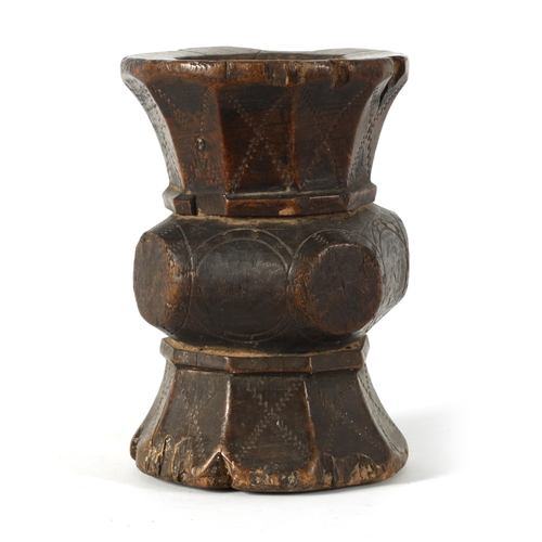 624 - AN 18TH-CENTURY AFRICAN-CARVED HARDWOOD TRIBAL MORTAR of scratch carved panelled double-sided form w... 