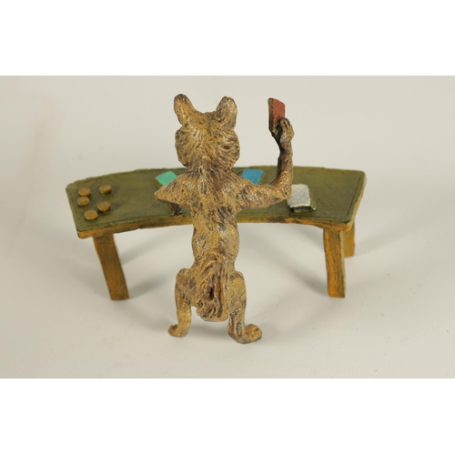 627 - FRANZ BERGMAN, AN EARLY 20TH CENTURY AUSTRIAN COLD PAINTED BRONZE OF A FOX PLAYING CARDS with 'B' wi... 