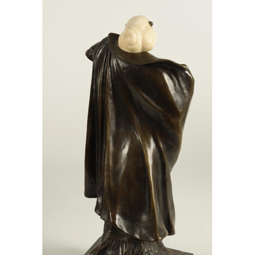 635 - ANTON ENDSTORFER (1880-1960) AN ART NOUVEAU BRONZE AND IVORY FIGURAL SCULPTURE depicting a young lad... 