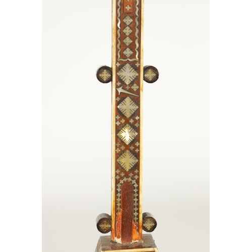 642 - AN 18TH/19TH CENTURY INDO PORTUGUESE MOTHER OF PEARL AND BONE-INLAID CRUCIFIX - on tapered platform ... 