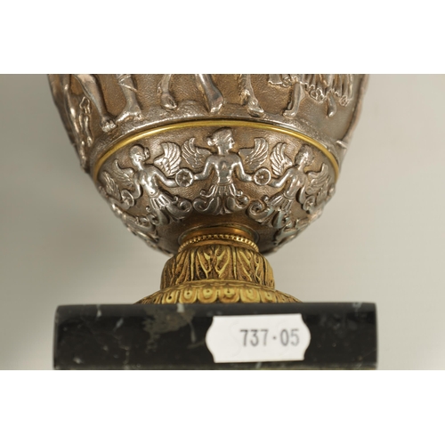 647 - A PAIR OF LATE 19TH CENTURY BRONZE AND SILVERED BRONZE GRAND TOUR URNS with stylised handles and sho... 