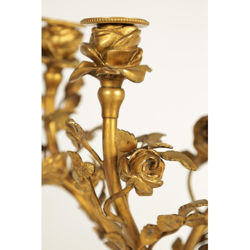 650 - AN IMPRESSIVE PAIR OF 19TH CENTURY FRENCH GILT BRONZE AND ROUGE MARBLE FOUR BRANCH CANDELABRA with f... 