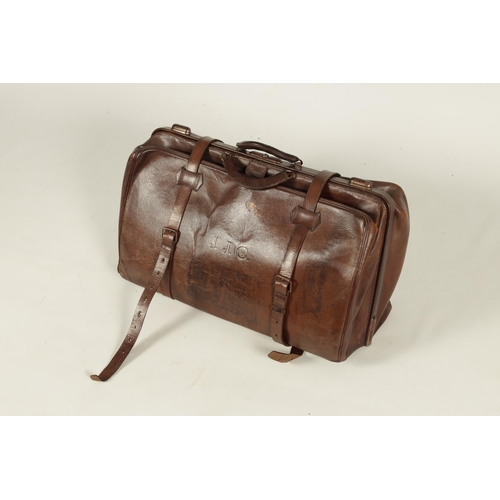 655 - A LARGE VINTAGE BROWN LEATHER GLADSTONE BAG with double catch and leather straps (65cm wide)