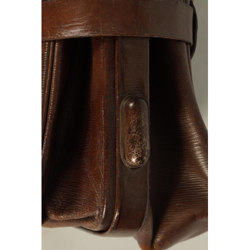 655 - A LARGE VINTAGE BROWN LEATHER GLADSTONE BAG with double catch and leather straps (65cm wide)