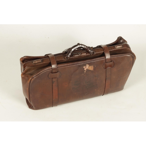 655 - A LARGE VINTAGE BROWN LEATHER GLADSTONE BAG with double catch and leather straps (65cm wide)