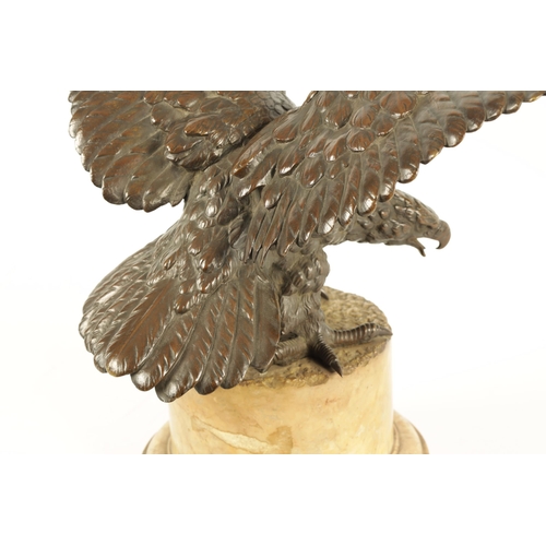 663 - A 19TH CENTURY FRENCH BRONZE SCULPTURE OF A DOUBLE-HEADED EAGLE depicted with wings outstretched on ... 