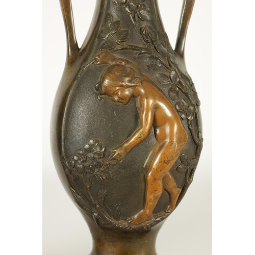 667 - E PROVOST A PAIR OF LATE 19TH CENTURY BRONZE TWO HANDLED FLATTENED OVOID VASES ON ROUGE MARBLE BASES... 