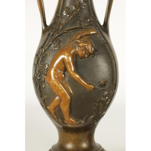 667 - E PROVOST A PAIR OF LATE 19TH CENTURY BRONZE TWO HANDLED FLATTENED OVOID VASES ON ROUGE MARBLE BASES... 