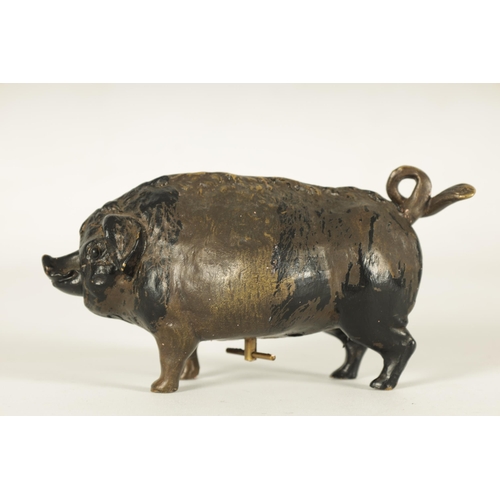 668 - A 20TH CENTURY COLD PAINTED BRONZE COUNTER BELL modelled as a fat bellied pig enclosing a mechanical... 