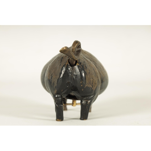 668 - A 20TH CENTURY COLD PAINTED BRONZE COUNTER BELL modelled as a fat bellied pig enclosing a mechanical... 