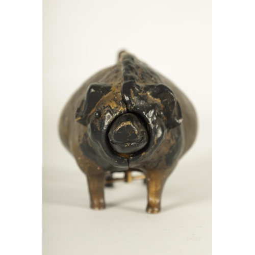 668 - A 20TH CENTURY COLD PAINTED BRONZE COUNTER BELL modelled as a fat bellied pig enclosing a mechanical... 