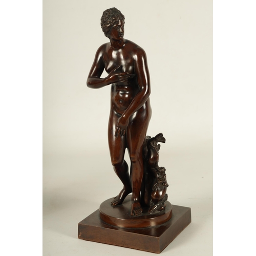 670 - A FINELY CAST 19TH CENTURY BRONZE FIGURE OF VENUS DE MEDICI rich brown patination on a circular and ... 