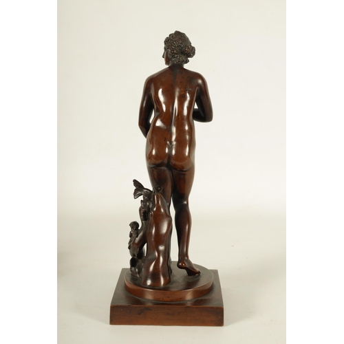 670 - A FINELY CAST 19TH CENTURY BRONZE FIGURE OF VENUS DE MEDICI rich brown patination on a circular and ... 