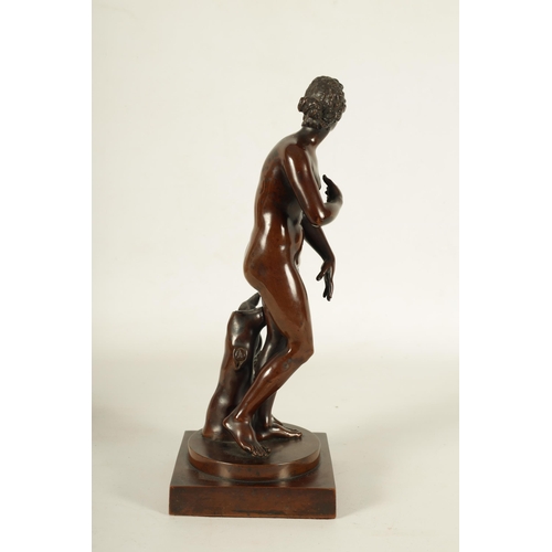 670 - A FINELY CAST 19TH CENTURY BRONZE FIGURE OF VENUS DE MEDICI rich brown patination on a circular and ... 