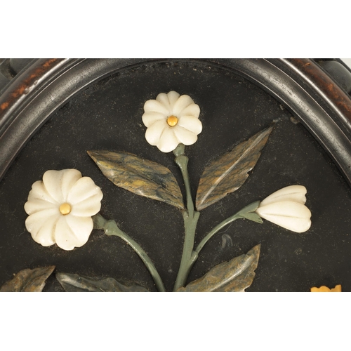 677 - A PAIR OF 19TH CENTURY ITALIAN BLACK SLATE AND PIETRA DURA SLENDER OVAL HANGING PLAQUES decorated in... 