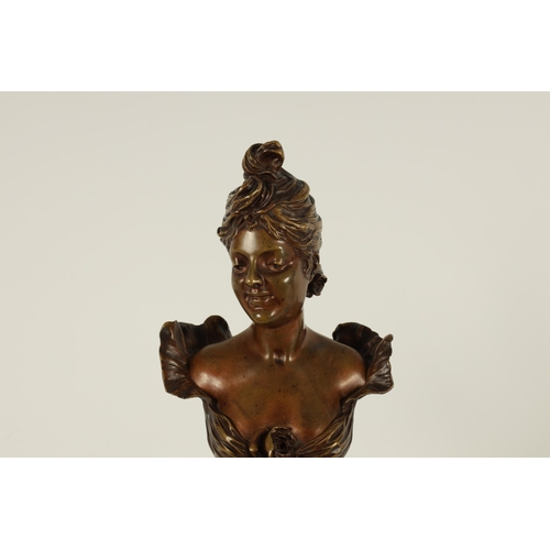 679 - MAURICE MAIGNAN. A FRENCH BRONZE AND ROUGE MARBLE BUST CIRCA 1900 modelled as a young woman mounted ... 