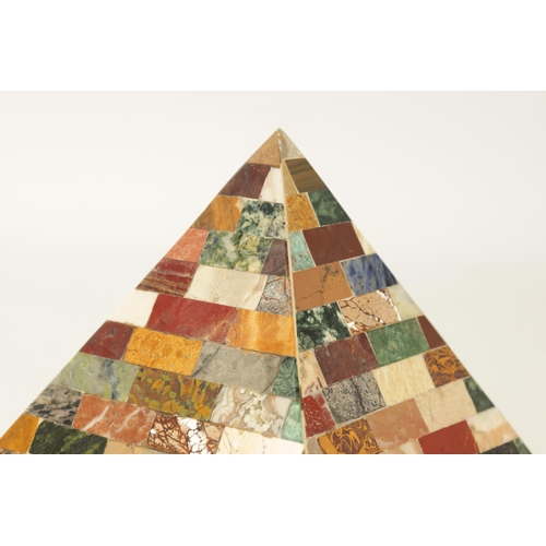 680 - A 19TH CENTURY STYLE COLOURED HARDSTONE PYRAMID modelled as layers of overlapping building blocks se... 