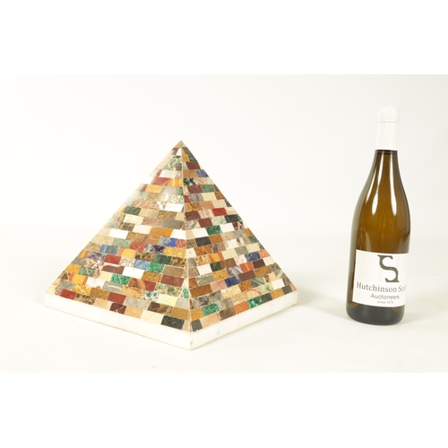 680 - A 19TH CENTURY STYLE COLOURED HARDSTONE PYRAMID modelled as layers of overlapping building blocks se... 