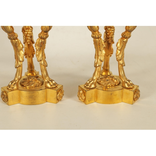 688 - A PAIR OF 19TH CENTURY FRENCH ORMOLU AND PORCELAIN PANELLED CANDLESTICKS the bodies inset with oval ... 