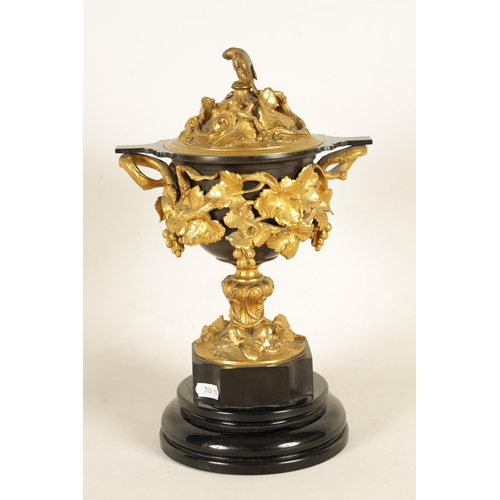 689 - A 19TH CENTURY FRENCH BRONZE AND ORMOLU VASE AND COVER the patinated bronze vase of campana form mou... 