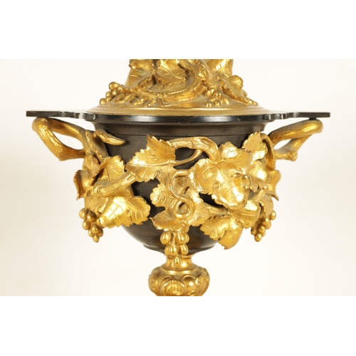 689 - A 19TH CENTURY FRENCH BRONZE AND ORMOLU VASE AND COVER the patinated bronze vase of campana form mou... 