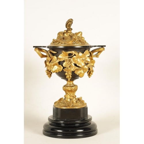 689 - A 19TH CENTURY FRENCH BRONZE AND ORMOLU VASE AND COVER the patinated bronze vase of campana form mou... 