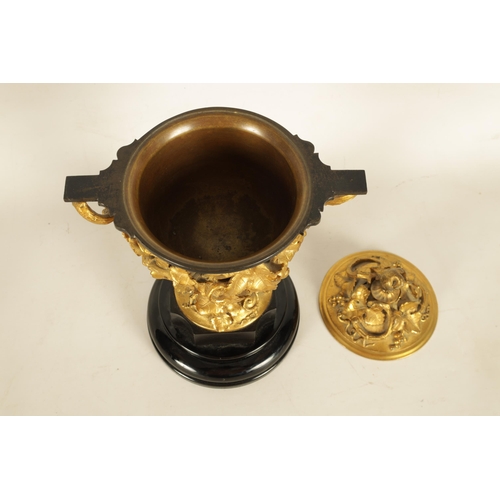 689 - A 19TH CENTURY FRENCH BRONZE AND ORMOLU VASE AND COVER the patinated bronze vase of campana form mou... 