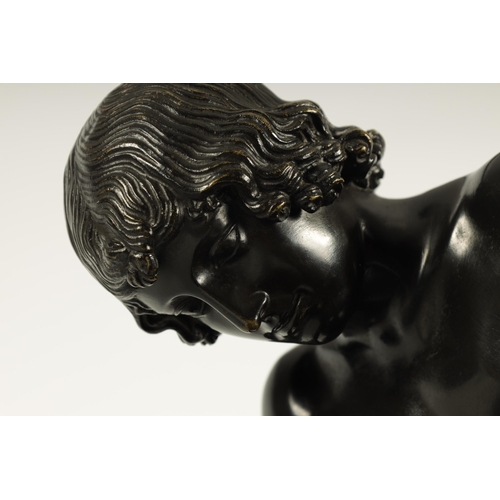 695 - A LATE 19TH CENTURY ITALIAN PATINATED BRONZE SCULPTURE modelled as a boy removing a thorn from his f... 