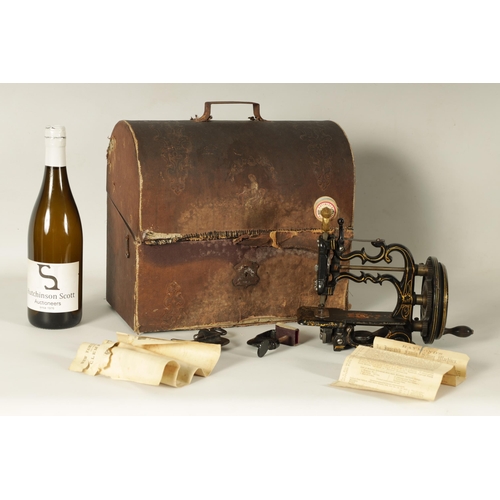 698 - CHARLES RAYMOND. A 19TH CENTURY PORTABLE CAST IRON SEWING MACHINE WITH ORIGINAL BOX painted black de... 